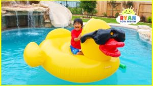 Ryan’s Swimming Pool Playtime for the first time in our new house with water slides!!!