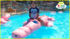Ryan plays at Water Park and rides Water Slides for kids!